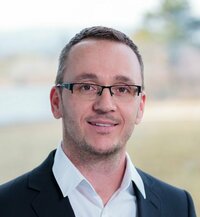Portrait of Michael Mayer, Regional Sales Director for DACH and Asia-Pacific at CODICO.